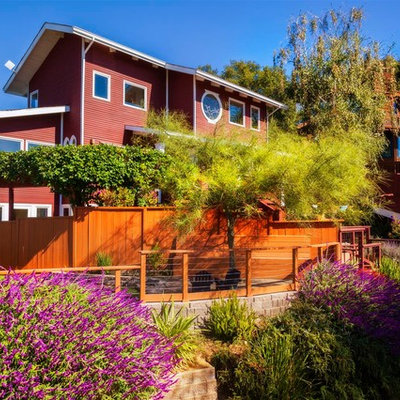 Example of a transitional red exterior home design in San Francisco