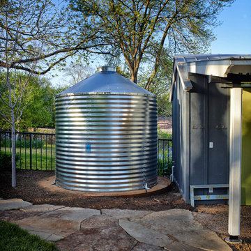7000 gallon rainwater storage, saves 70000 gallons a year in water