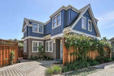 Inspiration for a mid-sized craftsman brown two-story mixed siding gable roof remodel in San Francisco