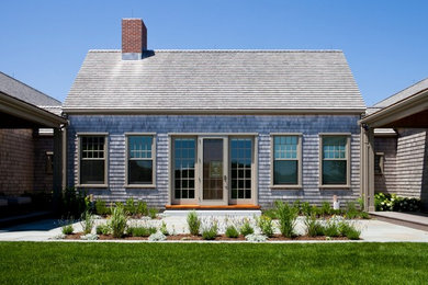 Example of a transitional wood gable roof design in Boston with a shingle roof