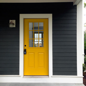 A door color to pop dark gray siding!