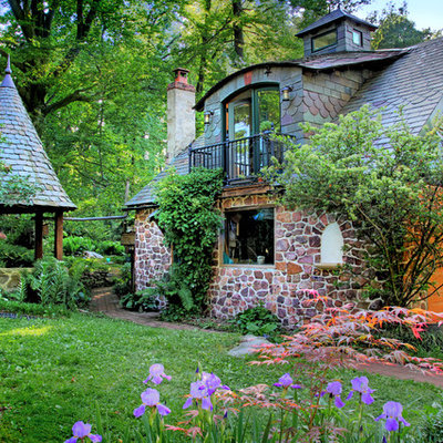 Example of a classic stone exterior home design in Philadelphia