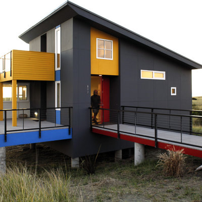 Inspiration for a small contemporary one-story exterior home remodel in Seattle with a shed roof