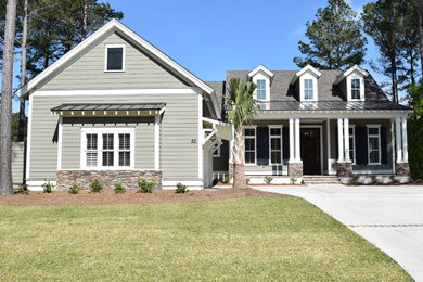 Inspiration for a mid-sized transitional green two-story exterior home remodel in Atlanta
