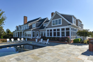 Example of a beach style exterior home design in DC Metro