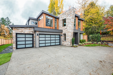 Large gray two-story exterior home photo in Seattle