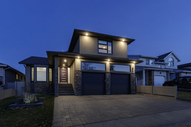 Inspiration for a contemporary exterior home remodel in Calgary
