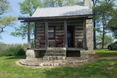 Inspiration for a small cottage one-story wood exterior home remodel in DC Metro
