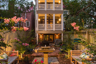 Example of a small classic white two-story wood exterior home design in DC Metro with a metal roof