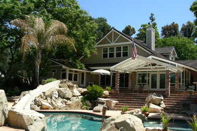 Example of a classic two-story exterior home design in San Diego