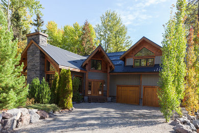 Mid-sized rustic gray two-story wood gable roof idea in Calgary