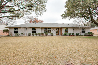 Mid-sized 1950s gray one-story brick exterior home photo in Dallas