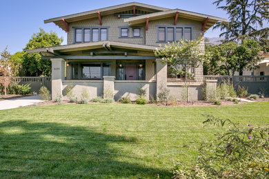 Photo of a large and green traditional two floor detached house in Santa Barbara with wood cladding, a pitched roof and a green roof.