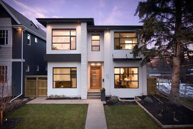 Transitional exterior home idea in Calgary