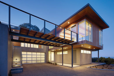 Large trendy gray two-story mixed siding exterior home photo in Atlanta