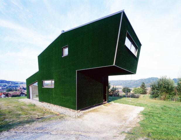 Modern Häuser by GRID Architektur ZT GmbH