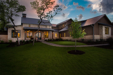 Inspiration for a large traditional house exterior in Austin.