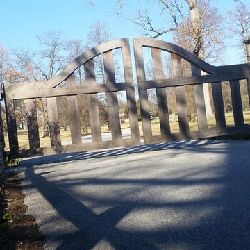 Arched wood gates