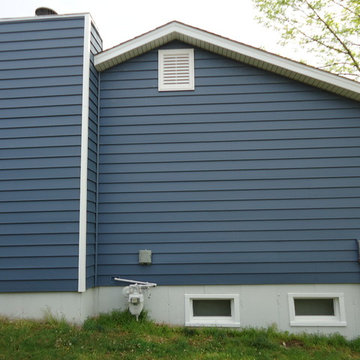 Architectural 7" wide insulated vinyl siding - Regatta Blue/White Trim