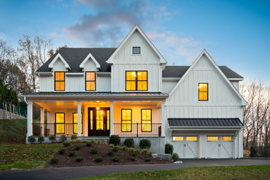 Example of a farmhouse exterior home design in Other