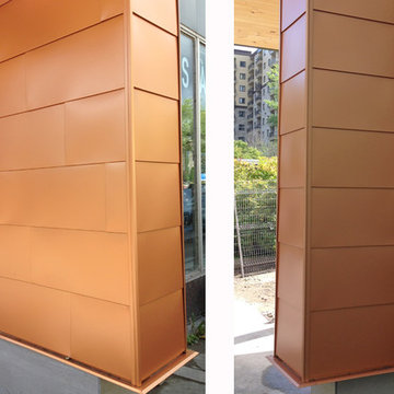 Architectural rectangular metal tile on siding