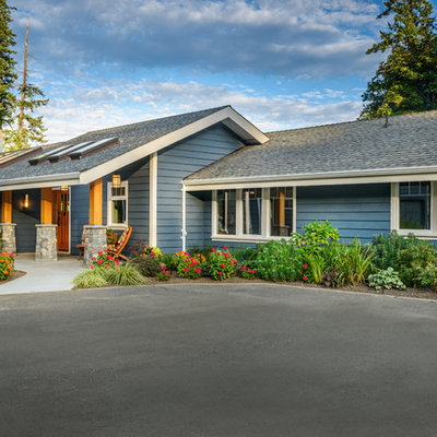 Example of a classic blue exterior home design in Vancouver