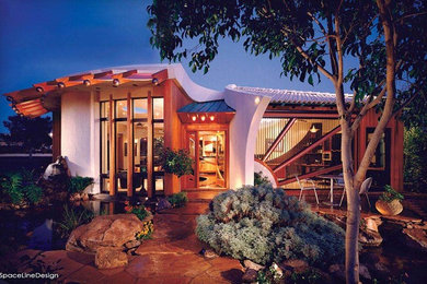 Small trendy one-story wood house exterior photo in Phoenix