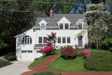 Example of a white two-story exterior home design in DC Metro