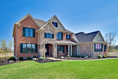 Example of a transitional exterior home design in Cincinnati