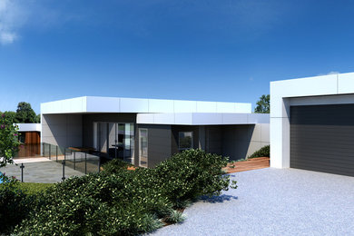 Modelo de fachada de casa negra moderna a niveles con revestimientos combinados, tejado plano y tejado de metal