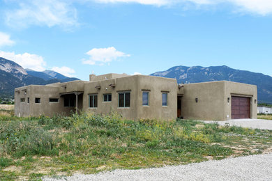 Southwestern exterior home idea in Albuquerque