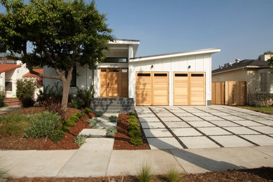 Inspiration for a large transitional white one-story concrete fiberboard exterior home remodel in Los Angeles