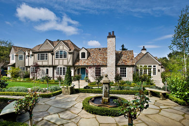 Example of a huge classic three-story stone exterior home design in San Francisco