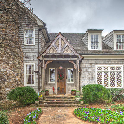 Example of a classic gray two-story exterior home design in Atlanta