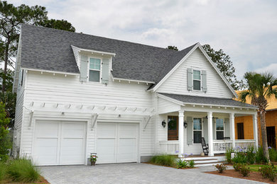 Example of a mid-sized beach style white two-story concrete fiberboard gable roof design in Jacksonville