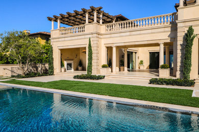 Large tuscan exterior home photo in Orange County