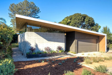 Example of a mid-century modern one-story mixed siding exterior home design in San Diego
