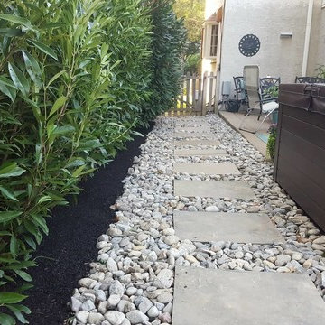 Backyard Oasis: Jacuzzi, Stepping Stones, Privacy Hedge