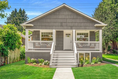 Mid-sized craftsman exterior home idea in Seattle