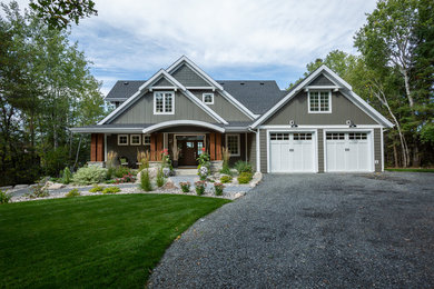 Inspiration for a large craftsman gray two-story concrete fiberboard exterior home remodel in Other with a shingle roof