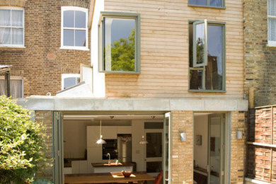 Mid-sized trendy exterior home photo in London