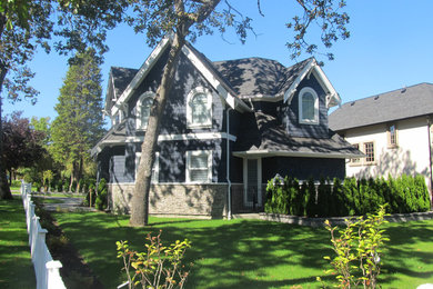 Example of an arts and crafts exterior home design in Vancouver