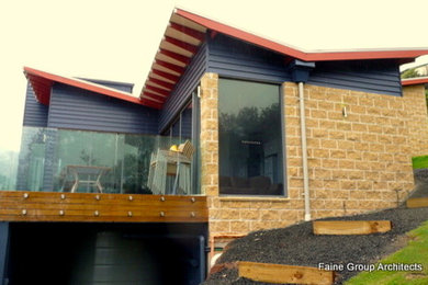 Design ideas for a modern house exterior in Sydney.