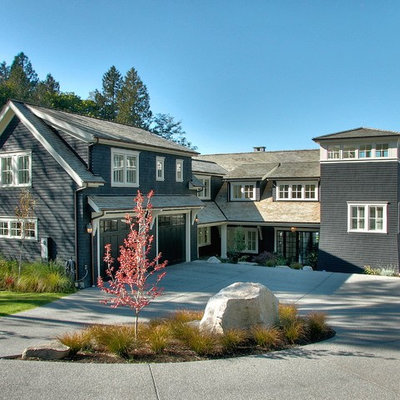 Mid-sized beach style two-story wood gable roof photo in Other
