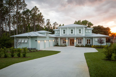 Large coastal two-story exterior home idea in Orlando
