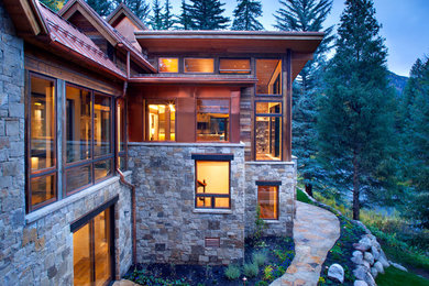 Mountain style two-story mixed siding exterior home photo in Denver