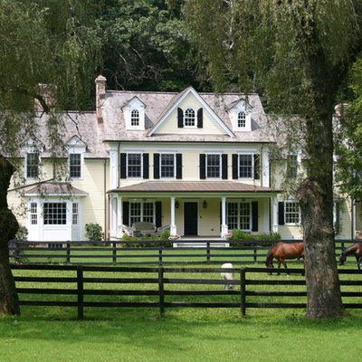 Example of a cottage wood exterior home design in New York