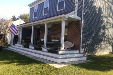 Example of a mid-sized arts and crafts blue two-story exterior home design in Baltimore