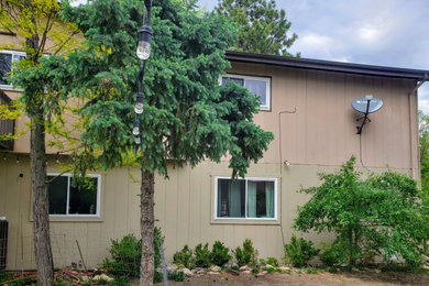 Example of a transitional exterior home design in Denver