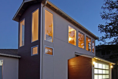 Example of a mid-sized minimalist beige two-story wood exterior home design in San Francisco